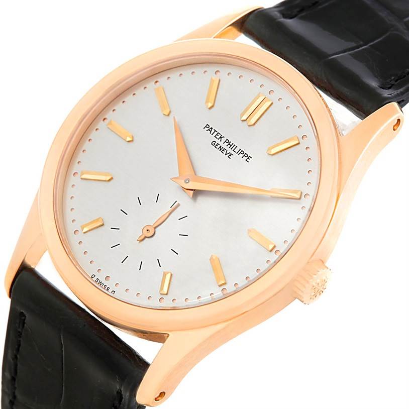 The image shows a close-up view of the dial, case, and part of the strap of a Vintage Patek Philippe watch.