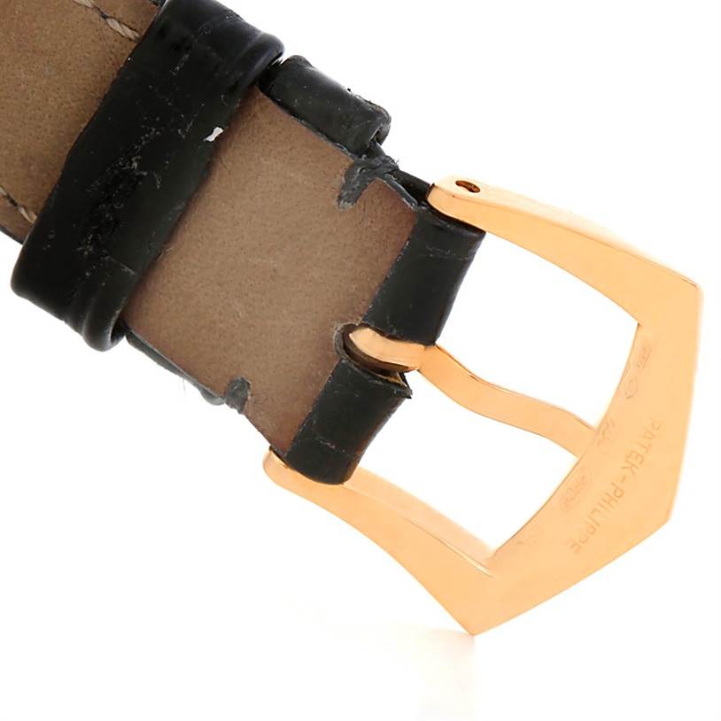 The image shows the buckle and part of the leather strap of a vintage Patek Philippe watch.