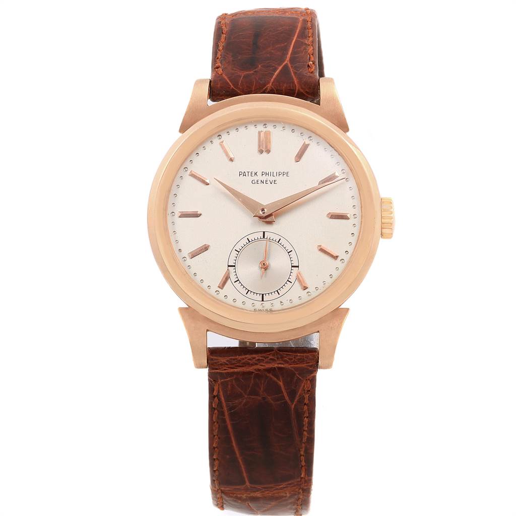 The image shows a frontal view of a Vintage Patek Philippe watch, featuring a leather strap and a classic round dial.