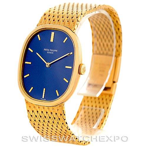 The image shows a Patek Philippe Golden Ellipse 3548/1 Men's Yellow Gold Blue Dial 3548/1 Men's Yellow Gold Blue Dial watch, angled to display its face, crown, and intricate gold bracelet.