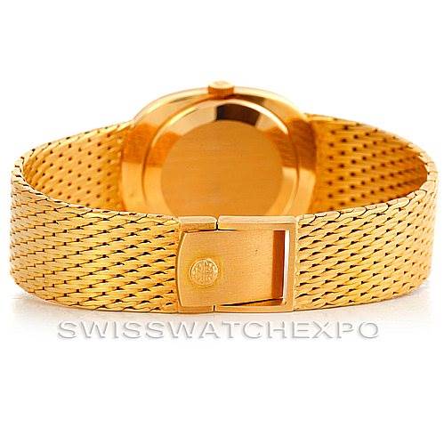 This image shows the back view of a Patek Philippe Golden Ellipse 3548/1 Men's Yellow Gold Blue Dial 3548/1 Men's Yellow Gold Blue Dial watch, featuring its clasp and gold mesh bracelet.