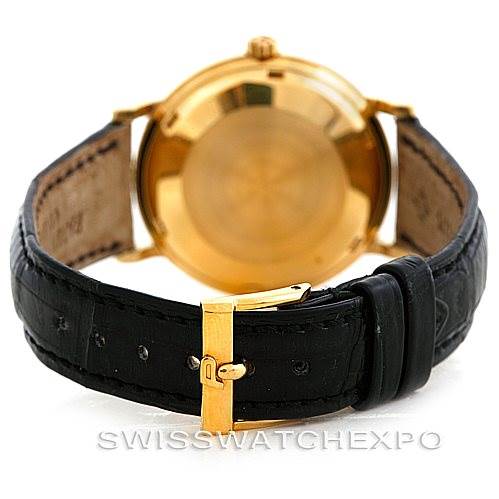 This image shows the back case, buckle, and leather strap of a Vintage Patek Philippe watch from a rear angle.