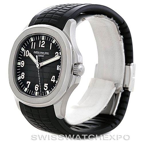 The image shows a side angle of the Patek Philippe Aquanaut 5167A Men's Stainless Steel Black Dial 5167A Men's Stainless Steel Black Dial watch, highlighting its black dial, numerals, and black rubber strap.