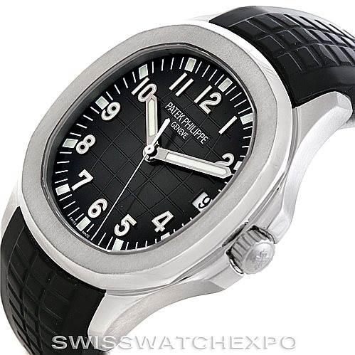 This image shows a side angle of the Patek Philippe Aquanaut 5167A Men's Stainless Steel Black Dial 5167A Men's Stainless Steel Black Dial watch, highlighting the dial, bezel, crown, and rubber strap.