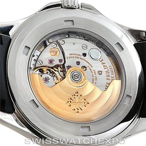 The image shows the back case of a Patek Philippe Aquanaut 5167A Men's Stainless Steel Black Dial 5167A Men's Stainless Steel Black Dial watch, revealing the intricate automatic movement inside.