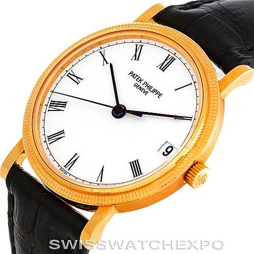 The image shows a Patek Philippe Calatrava 3802 Men's Yellow Gold White Dial 3802 Men's Yellow Gold White Dial watch at an angled view, highlighting the face, crown, and black leather strap.