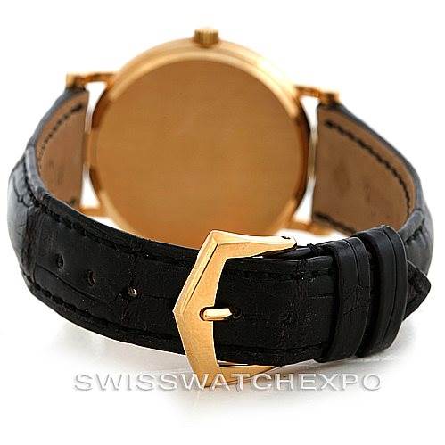 This image shows the back of a Patek Philippe Calatrava 3802 Men's Yellow Gold White Dial 3802 Men's Yellow Gold White Dial watch, focusing on the leather strap and gold clasp.