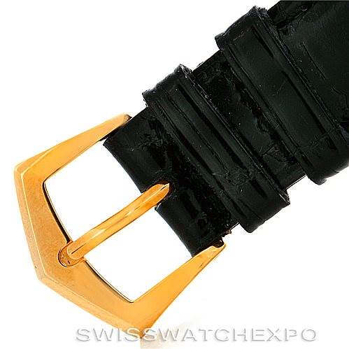 This image shows a close-up view of the gold buckle and black leather strap of a Patek Philippe Calatrava 3919 Men's Yellow Gold White Dial 3919 Men's Yellow Gold White Dial watch.