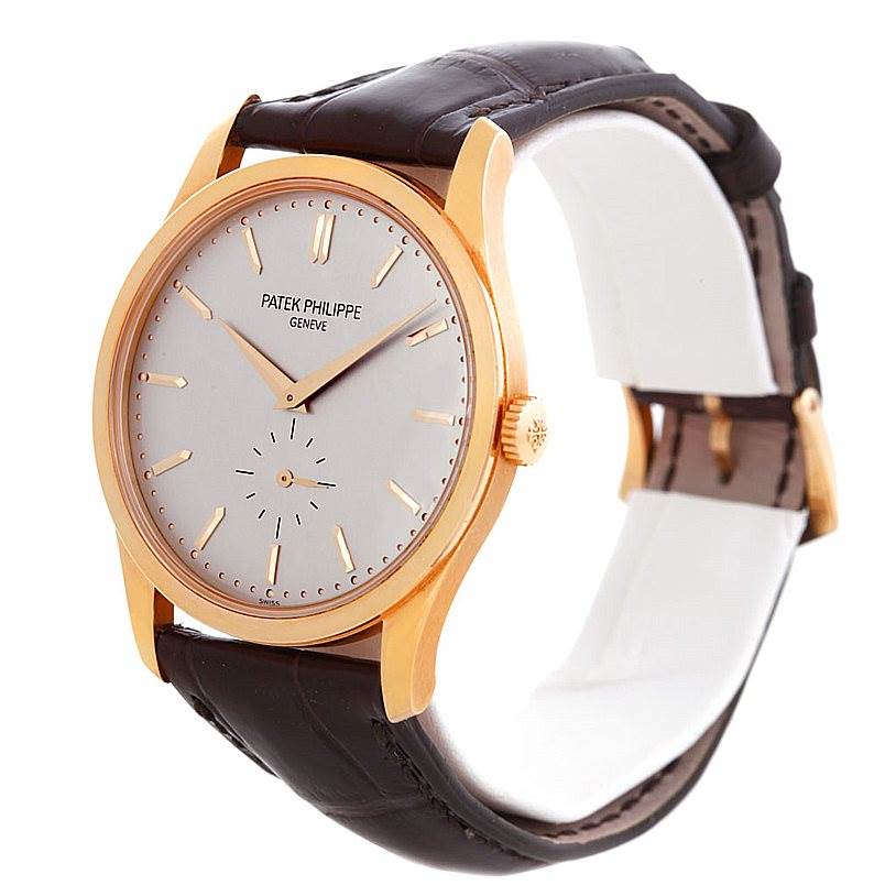 The image shows a front angled view of a Patek Philippe Calatrava 5196R Men's Rose Gold Silver Dial 5196R Men's Rose Gold Silver Dial watch, displaying the face, hands, crown, and leather strap.