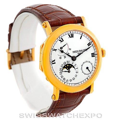 The image shows a Patek Philippe Complications 5054 Men's Yellow Gold White Dial 5054 Men's Yellow Gold White Dial model watch, angled slightly from the front, with a brown leather strap and gold casing.