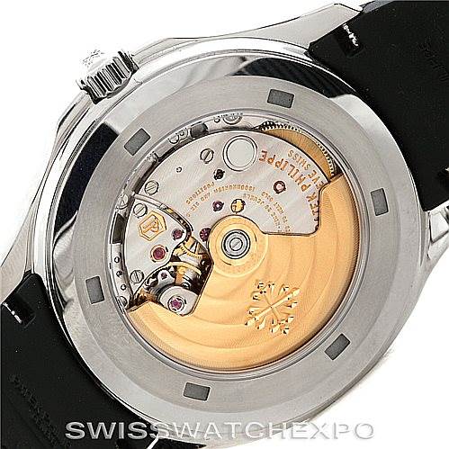 The image shows the case back of the Patek Philippe Aquanaut 5167A Men's Stainless Steel Black Dial 5167A Men's Stainless Steel Black Dial watch, revealing the intricate movement and rotor inside.