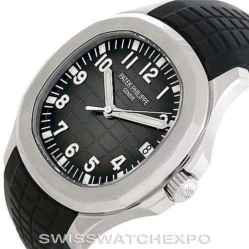 This image shows a Patek Philippe Aquanaut 5167A Men's Stainless Steel Black Dial 5167A Men's Stainless Steel Black Dial watch taken from an angled side view, displaying the dial, bezel, crown, and part of the strap.