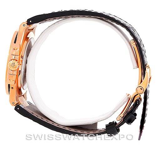 The image shows a side profile of a Patek Philippe Nautilus 5712R Men's Rose Gold  5712R Men's Rose Gold  watch, highlighting the crown, case, and strap.