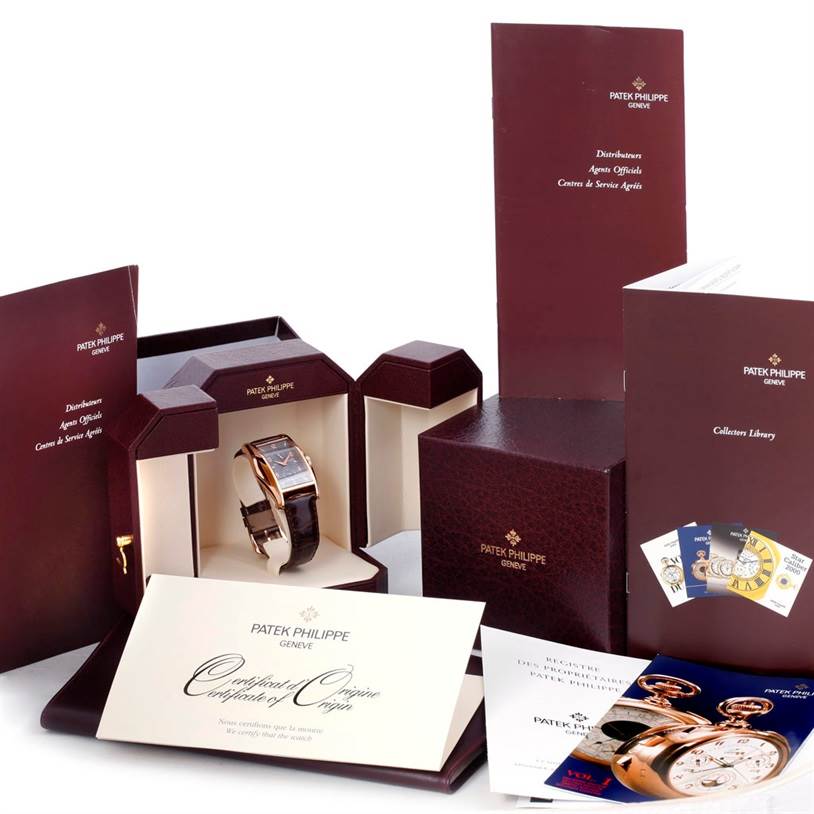 The image shows the Patek Philippe 5100R Men's Rose Gold Grey Dial 5100R Men's Rose Gold Grey Dial Manta Ray Rose Gold 10 Day Power Reserve Watch LE 5100R with its original packaging and documentation.