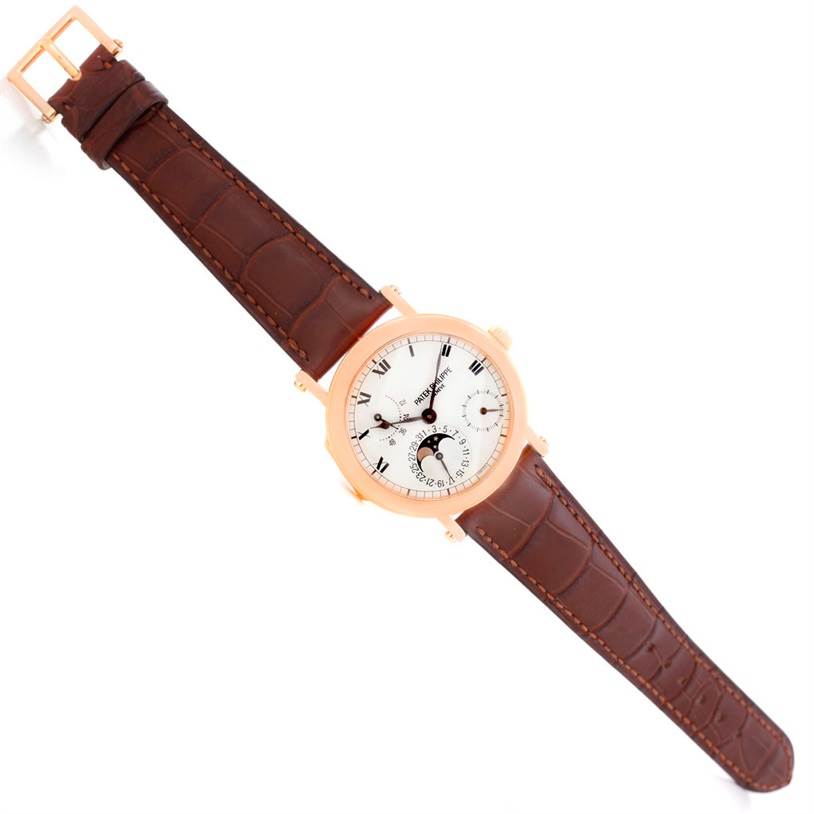 The Power Reserve Moonphase Rose Gold Watch 5054 by Patek Philippe 5054 Men
s Rose Gold White Dial 5054 Men
s Rose Gold White Dial is shown from above, featuring the leather strap and full watch face.