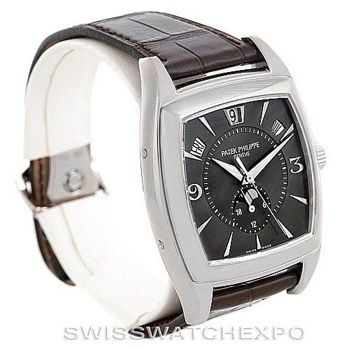 The image shows a Patek Philippe 5135G Men's White Gold Black Dial 5135G Men's White Gold Black Dial Complicated Annual Calendar Men's Watch 5135G at a three-quarter angle, highlighting the watch face, strap, and crown.