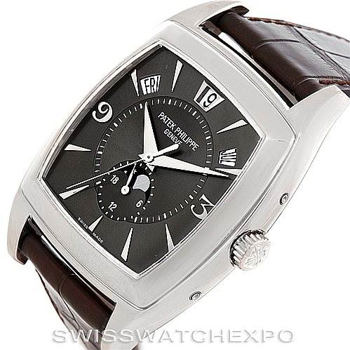 This image shows a Patek Philippe 5135G Men's White Gold Black Dial 5135G Men's White Gold Black Dial Complicated Annual Calendar Men's Watch 5135G at an angled front view, highlighting the dial and crown.