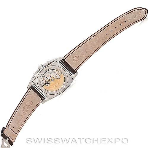 The image shows the back view of a Patek Philippe 5135G Men's White Gold Black Dial 5135G Men's White Gold Black Dial Complicated Annual Calendar Mens Watch 5135G, highlighting the movement and watch strap.