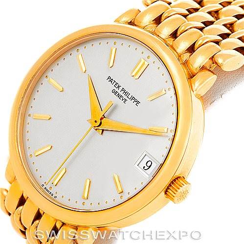 The image shows a Patek Philippe Calatrava 3998 Men's Yellow Gold Silver Dial 3998 Men's Yellow Gold Silver Dial watch at a slight angle, highlighting the dial, bracelet, and crown.