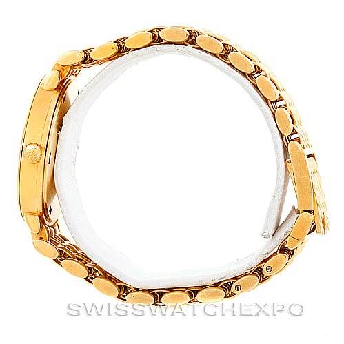 The image shows a side view of the Calatrava model watch by Patek Philippe, focusing on the crown and bracelet.