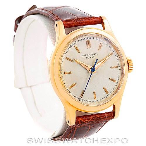 This image shows a front-angle view of a Vintage Patek Philippe watch, showcasing the dial, hands, crown, and leather strap.