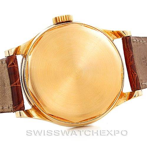 This image shows the back case and leather straps of a Patek Philippe Vintage watch.