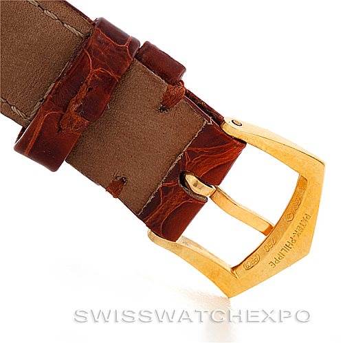 The image shows a close-up of the buckle and leather strap of a Vintage Patek Philippe watch.