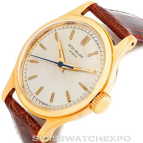 The image shows the front and slightly tilted right angle of a Vintage Patek Philippe watch, highlighting its dial, markers, hands, case, crown, and strap.