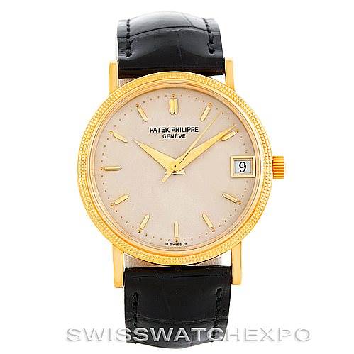 The image shows a frontal view of the Vintage Patek Philippe watch, showcasing its dial, hands, indices, date window, and leather strap.