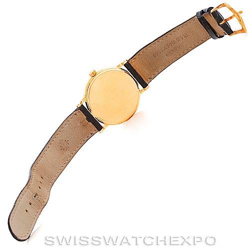 The image shows the back view of a Vintage Patek Philippe watch, including the strap and buckle.
