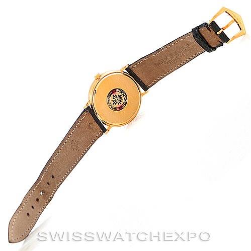 The image shows the back view and strap of a Patek Philippe Calatrava 3944 Men's Yellow Gold White Dial 3944 Men's Yellow Gold White Dial watch.