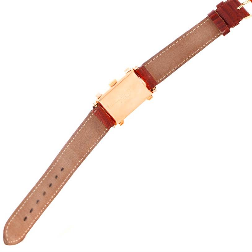 The image shows the back and straps of a Vintage Patek Philippe watch, displaying the case back and leather strap with stitching.