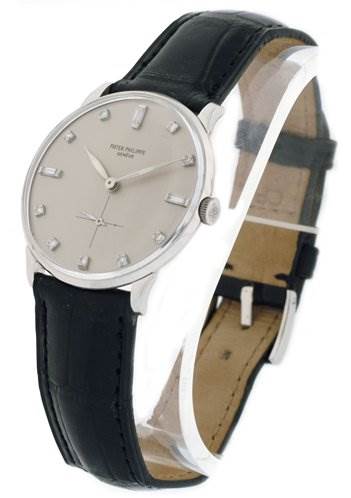 The image shows a Patek Philippe 2573/2 Platinum Silver Dial 2573/2 Platinum Silver Dial Vintage Men Platinum Diamond 2573/2 watch at an angled front view, highlighting its dial and leather strap.