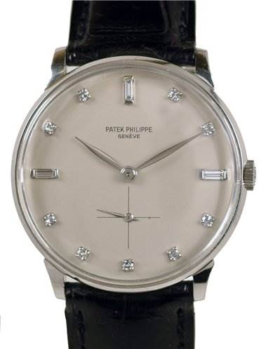 This is a front view of a Patek Philippe 2573/2 Platinum Silver Dial 2573/2 Platinum Silver Dial Vintage Men Platinum Diamond 2573/2 Rare watch showing the face, hands, and leather strap.