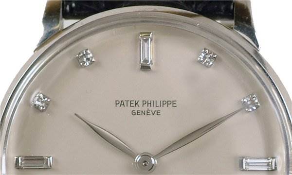 The image shows the close-up of the dial of a Vintage Men Platinum Diamond 2573/2 Rare model by Patek Philippe 2573/2 Platinum Silver Dial 2573/2 Platinum Silver Dial.