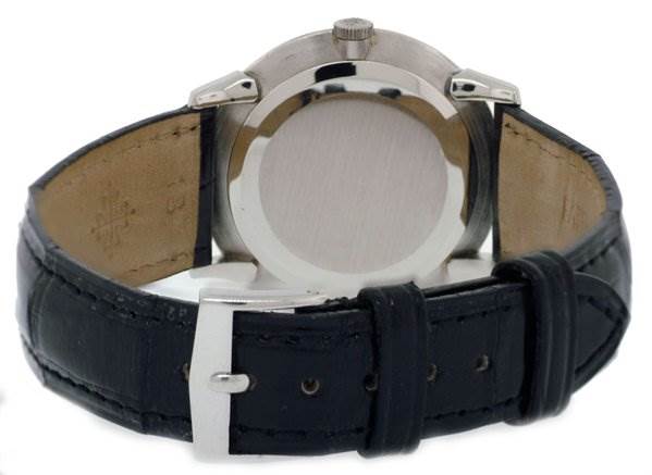 This image shows the back view of the Patek Philippe 2573/2 Platinum Silver Dial 2573/2 Platinum Silver Dial Vintage Men Platinum Diamond 2573/2 watch, highlighting its strap and clasp.