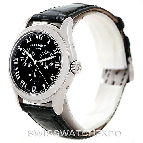 This image shows a side angle view of the Patek Philippe 5035G Men's White Gold Black Dial 5035G Men's White Gold Black Dial Complicated Annual Calendar Men's Watch 5035G with a black leather strap and black dial.
