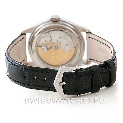The image shows the back view of the Patek Philippe 5035G Men's White Gold Black Dial 5035G Men's White Gold Black Dial Complicated Annual Calendar Men's Watch 5035G, highlighting the movement and black leather strap.