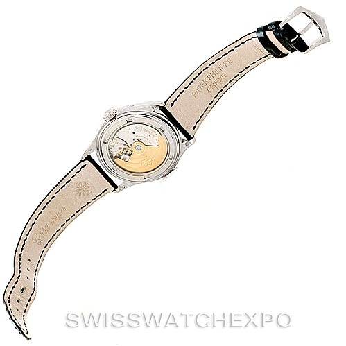 This image shows the back of the Patek Philippe 5035G Men's White Gold Black Dial 5035G Men's White Gold Black Dial Complicated Annual Calendar Men's Watch 5035G, displaying the movement and leather straps.