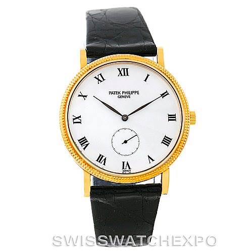 The image shows a frontal view of a Patek Philippe Calatrava 3919 Men's Yellow Gold White Dial 3919 Men's Yellow Gold White Dial watch with a white dial, Roman numerals, and a black leather strap.