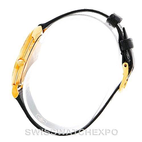 This image shows the side profile of a Patek Philippe Calatrava 3919 Men's Yellow Gold White Dial 3919 Men's Yellow Gold White Dial watch, highlighting its case and strap.