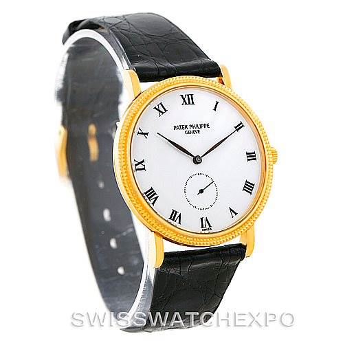 The image shows a Patek Philippe Calatrava 3919 Men's Yellow Gold White Dial 3919 Men's Yellow Gold White Dial watch at a slight angle, displaying its face, gold bezel, and black leather strap.