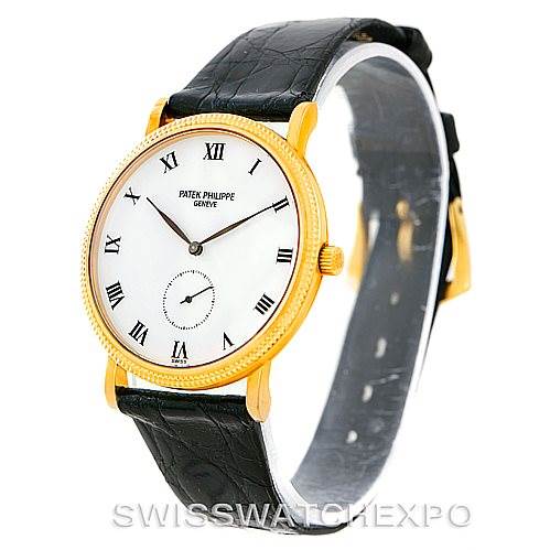 This image shows a frontal angle of a Patek Philippe Calatrava 3919 Men's Yellow Gold White Dial 3919 Men's Yellow Gold White Dial watch, highlighting its gold case, white dial, and black leather strap.