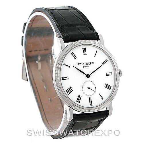 The image shows a side-angle view of the Patek Philippe Calatrava 5119G Men's White Gold White Dial 5119G Men's White Gold White Dial watch, highlighting its dial, case, and leather strap.