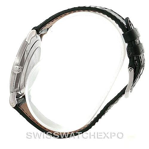 The image shows a side view of a Patek Philippe Calatrava 5119G Men's White Gold White Dial 5119G Men's White Gold White Dial watch, focusing on its case, crown, and leather strap.