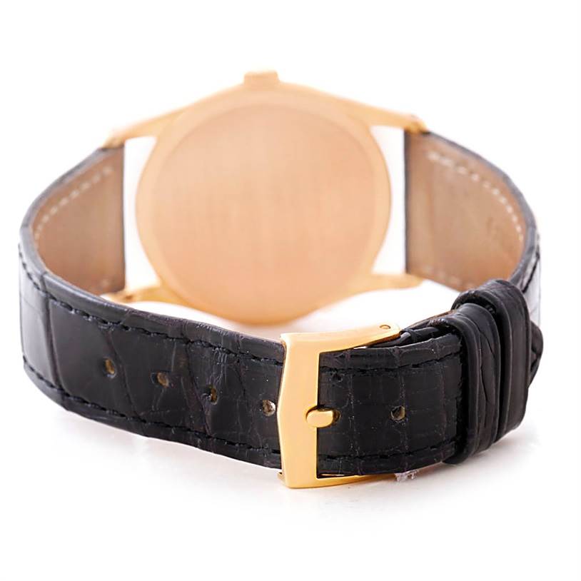 This image shows the rear view of the Patek Philippe Calatrava 3796R Men
s Rose Gold White Dial 3796R Men
s Rose Gold White Dial watch, highlighting its black leather strap and gold buckle.