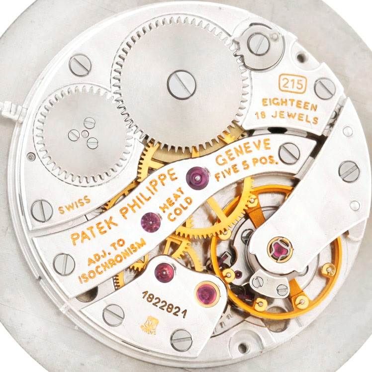 This image shows the movement of a Patek Philippe Calatrava 3919 Men
s Rose Gold White Dial 3919 Men
s Rose Gold White Dial watch from a top-down view.
