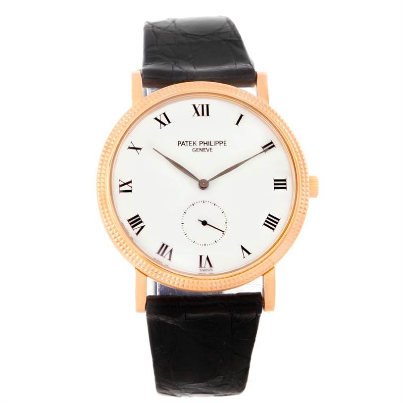 This image shows a front view of the Patek Philippe Calatrava 3919 Men
s Rose Gold White Dial 3919 Men
s Rose Gold White Dial watch, highlighting the dial, case, hands, and leather strap.