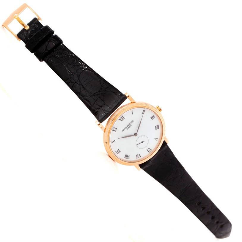 The image shows a Patek Philippe Calatrava 3919 Men
s Rose Gold White Dial 3919 Men
s Rose Gold White Dial watch at a slight angle, displaying its dial, case, crown, and black leather strap.