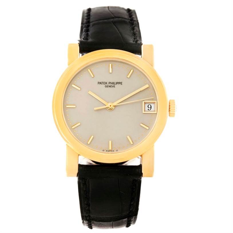 This image shows a front view of the Patek Philippe Calatrava 5012 Men
s Yellow Gold Beige Dial 5012 Men
s Yellow Gold Beige Dial watch, highlighting its face, hands, and strap.